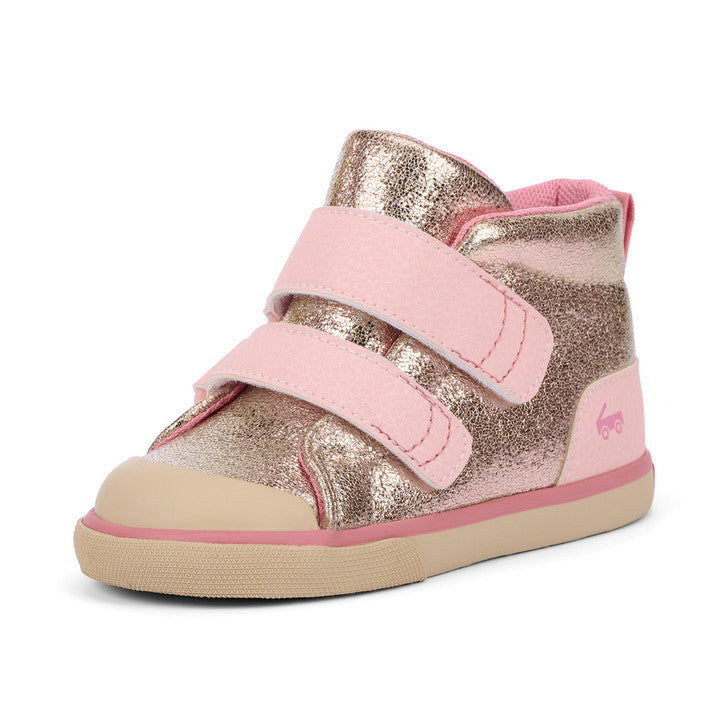 Pink and gold children's shoe with a visible brand logo on a white background