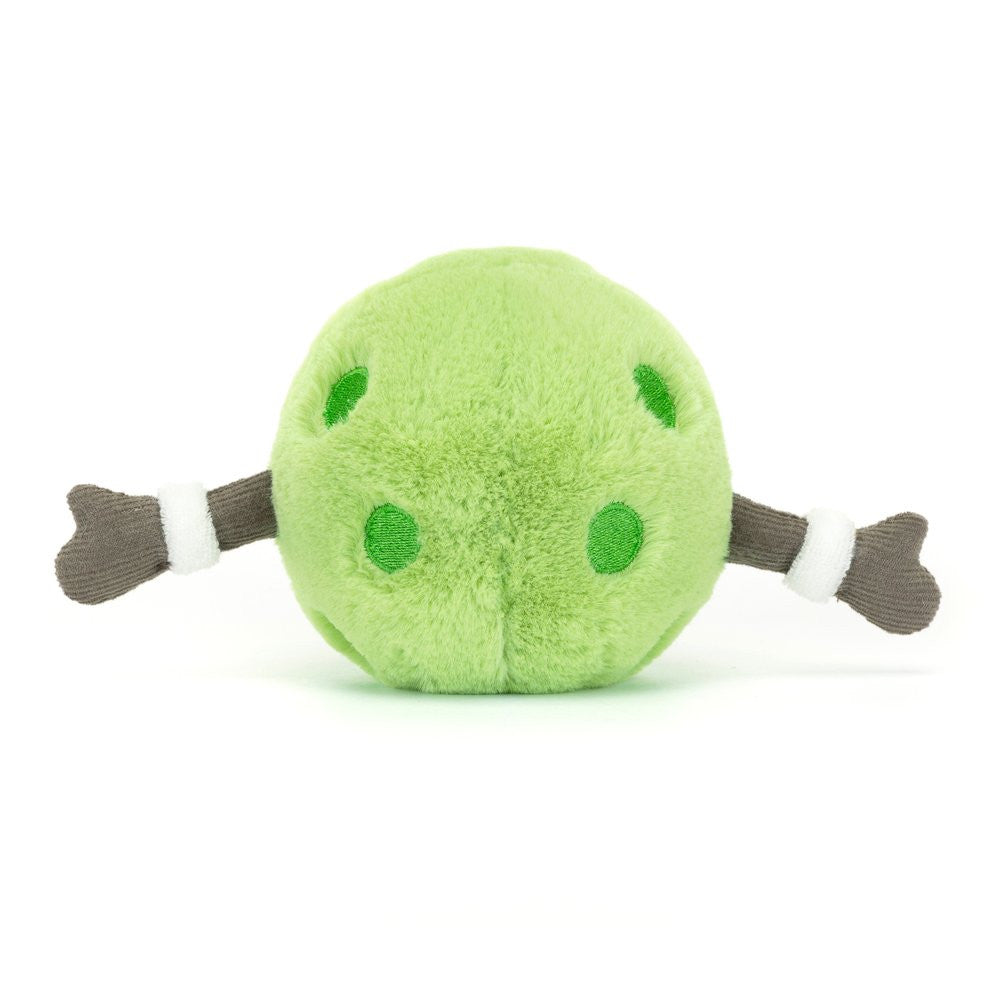 A plush toy resembling a green pickleball with arms.
