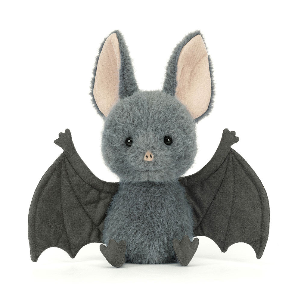 A plush gray bat toy with large upright ears, dark wings, and a small pink nose, photographed against a clean white background.