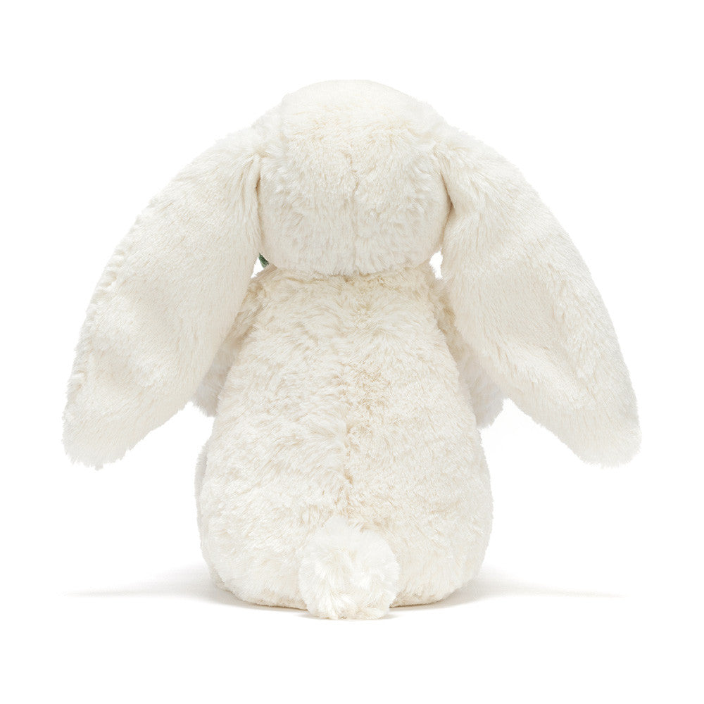 White plush bunny toy on a white background