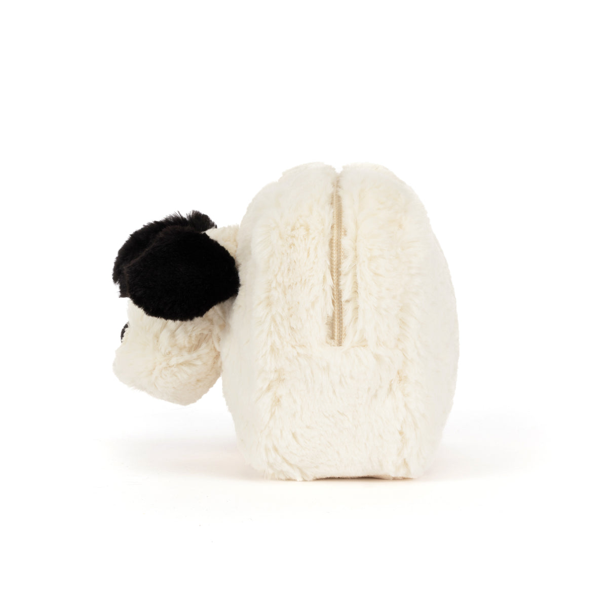 A plush sheep-shaped zippered pouch in cream white faux fur with a black fluffy ear, shown from the side on a white background.