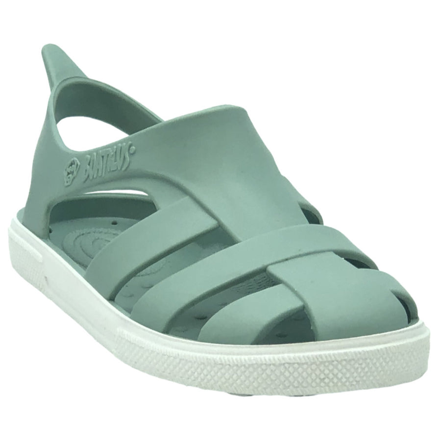 Green sandal with white sole on a white background