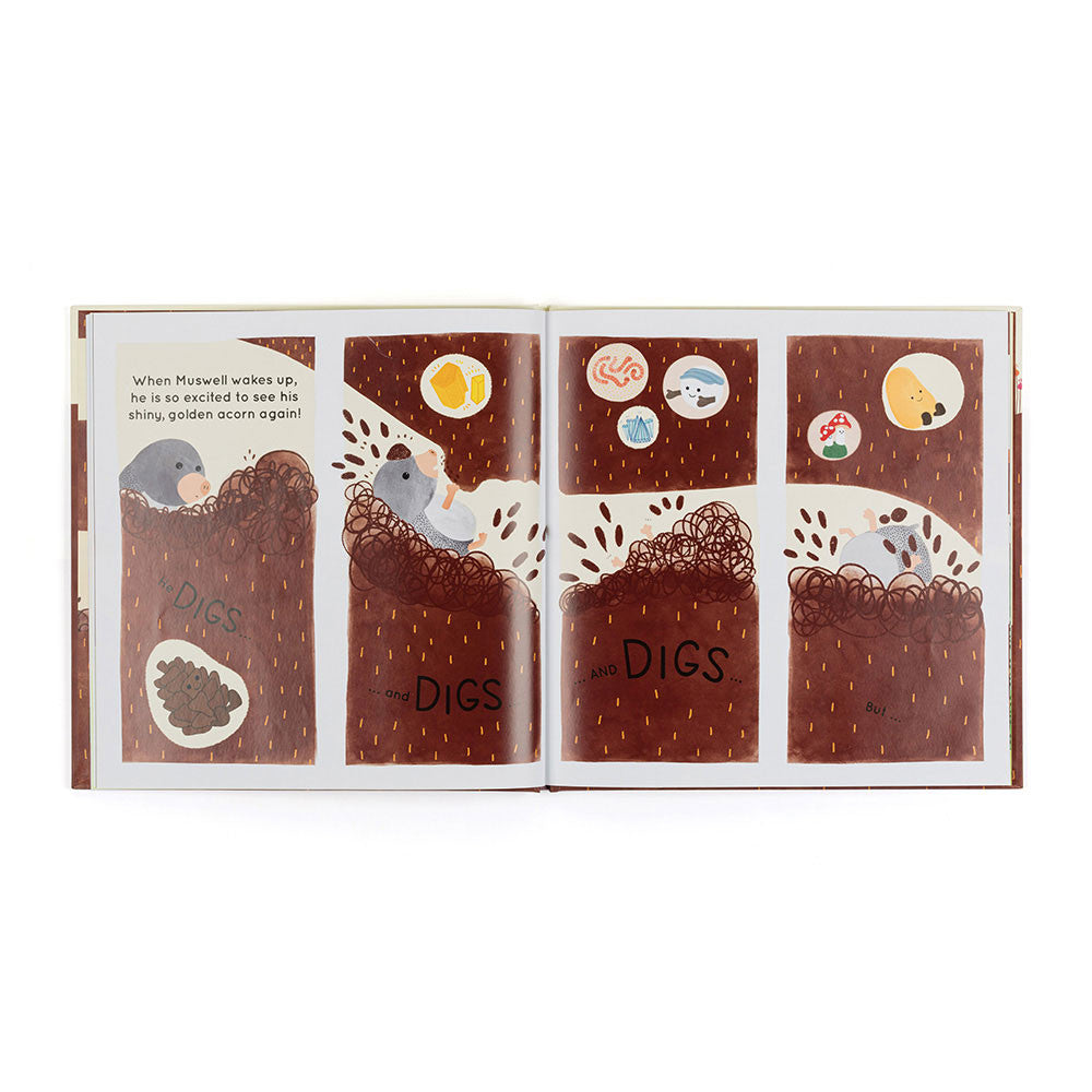 Open book showing a cartoon dog digging in the ground with illustrations of bones and toys.