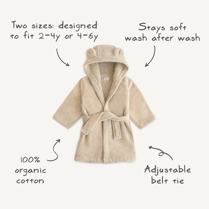 Beige children's robe with features highlighted on a white background