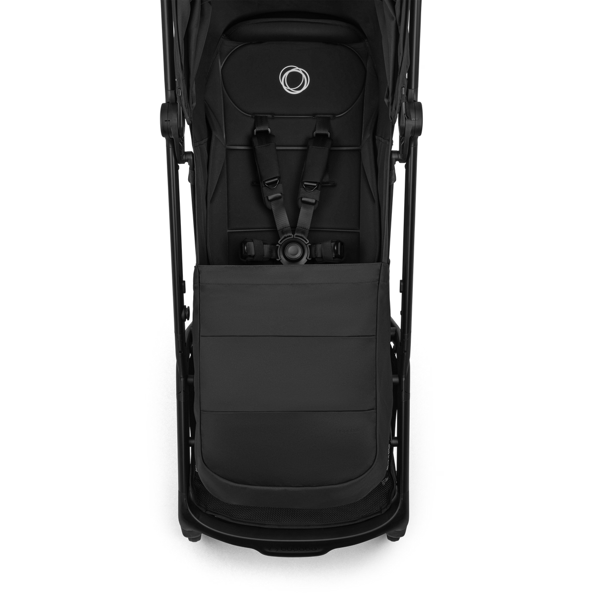 A top-down view of a black stroller with a matching black footmuff, showing the harness straps and the circular logo on the headrest against a white background.