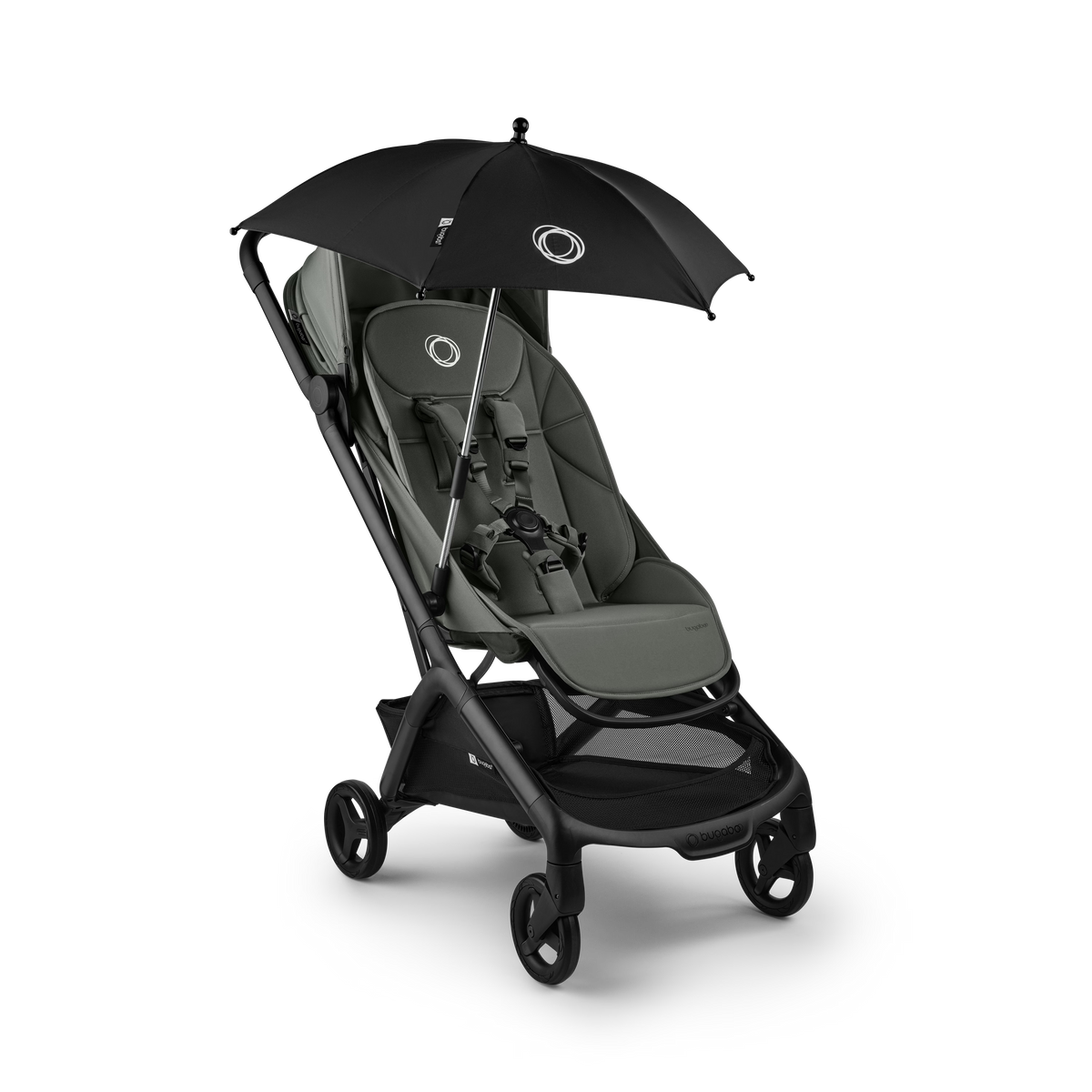 A stroller with a black canopy umbrella attached, shown on a clean white background. The stroller features a dark gray and black frame with a gray seat cushion, and the umbrella is black with a small white circular logo.