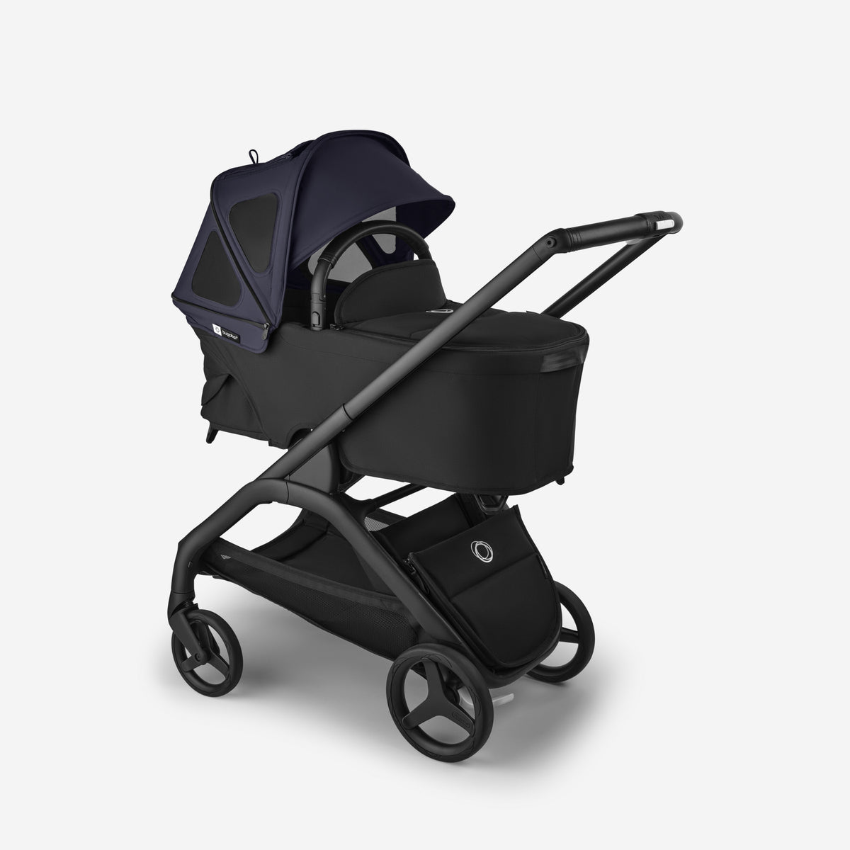 Black stroller with navy canopy on a white background