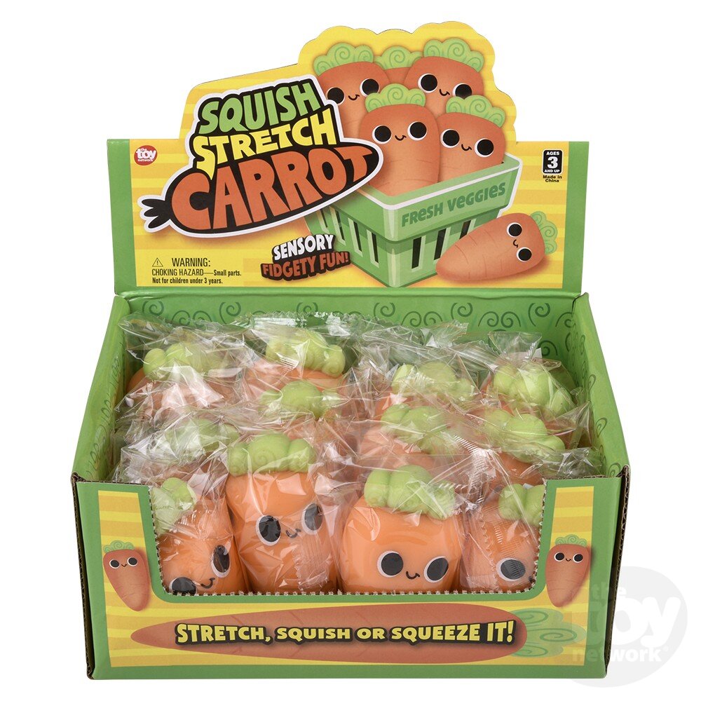 Display box of Squish Stretch Carrots sensory toys with a yellow lid and green base.