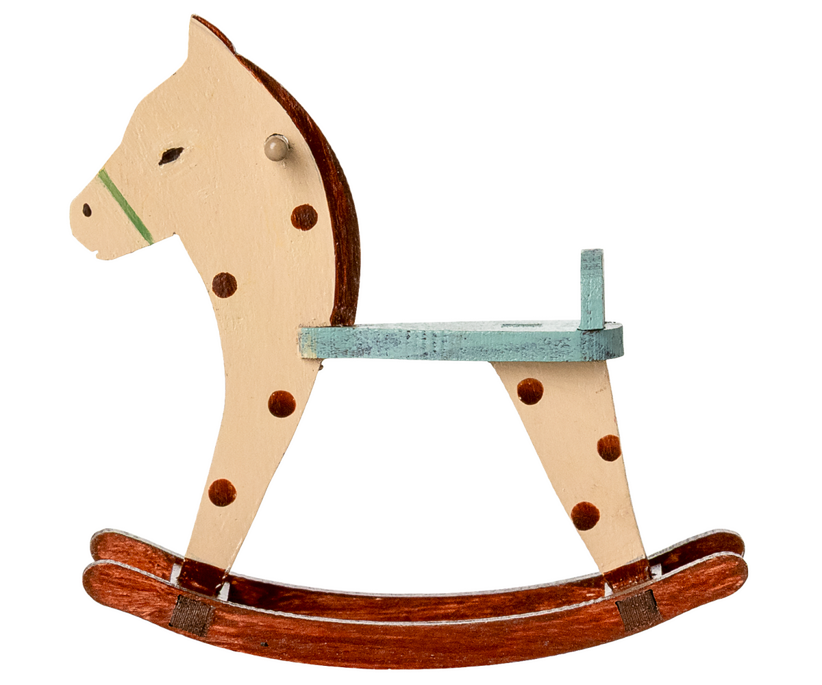 Wooden rocking horse with a white body, brown mane, and red-brown saddle on a white background