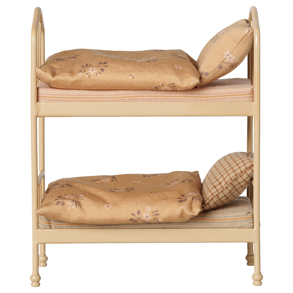 A miniature two-tier dollhouse bed frame with beige fabric bedding and pillows, shown against a plain white background.