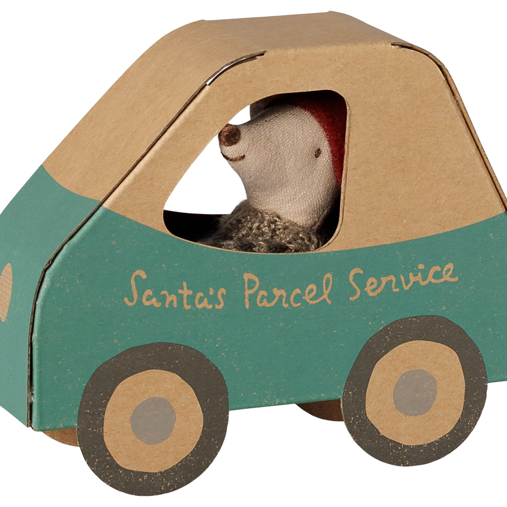A Maileg Christmas Little Brother mouse peeking out from the window of a teal and cardboard-colored miniature car box labeled "Santa's Parcel Service" on the side.
