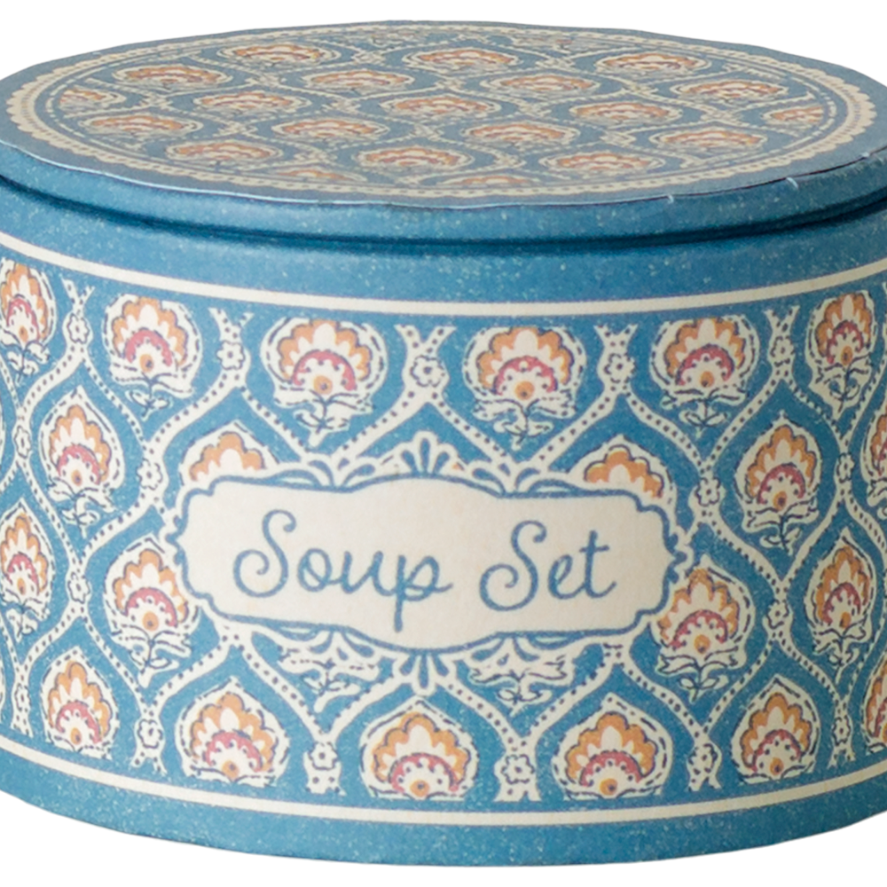 A product photo of the Soup Set, Mouse by Maileg packaging box, featuring a round, blue patterned container with a decorative label on the front that reads "Soup Set" in script lettering.