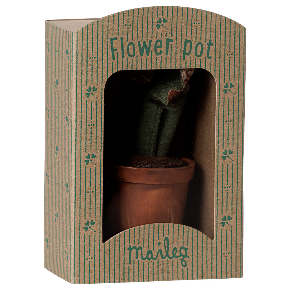 A miniature Maileg potted plant in decorative packaging designed to look like a tiny storefront or greenhouse box labeled "Flower pot" and "maileg."