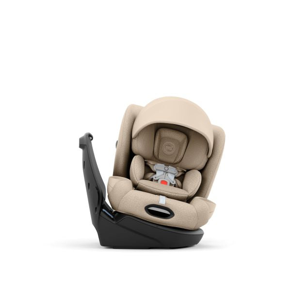 Beige baby car seat with black base on a white background