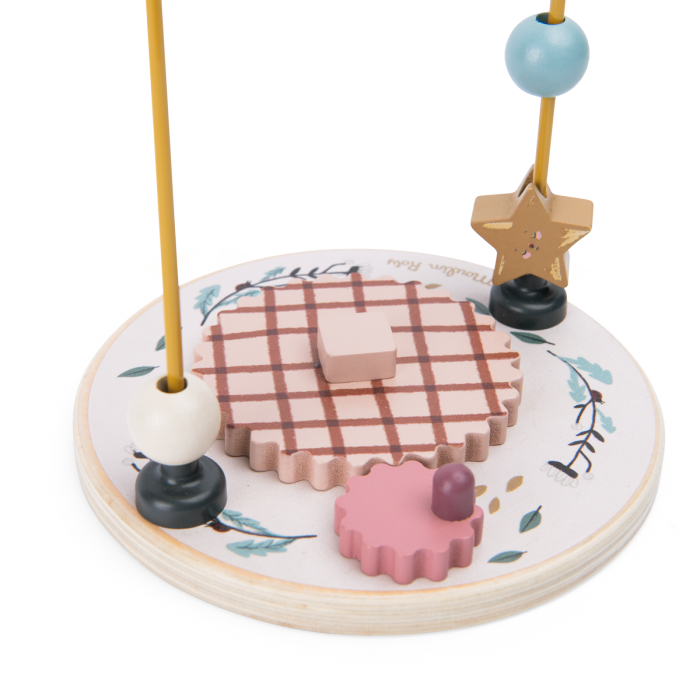 Wooden toy with plaid and pink shapes on a white background