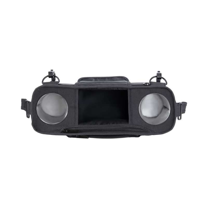 Black car headlight assembly on a white background