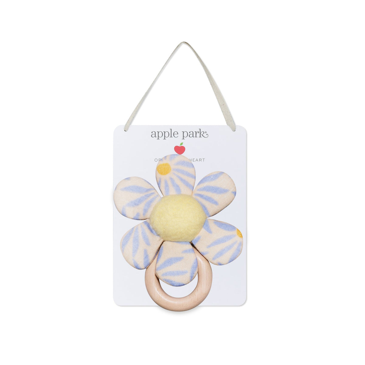 Flower-shaped teething ring with wooden elements on a white background