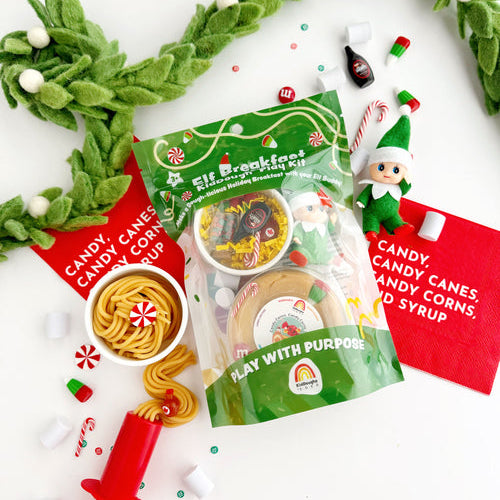 Elf on the Shelf playset with candy-themed packaging and accessories on a white background.