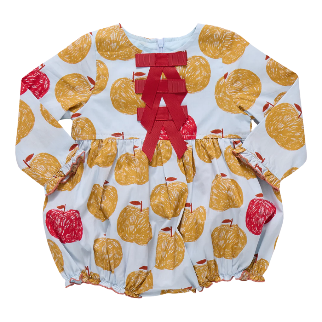 A long-sleeve baby romper with an apple print pattern on a light blue background, featuring a red ribbon bow at the neckline.