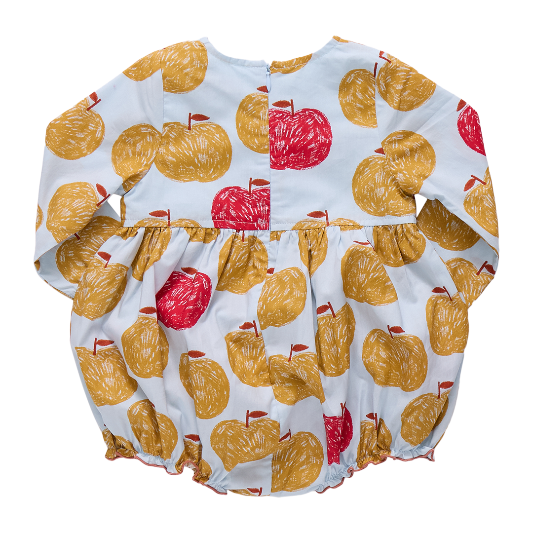Baby romper with apple pattern on a white background