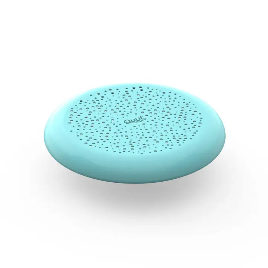 Turquoise wireless speaker on a white background