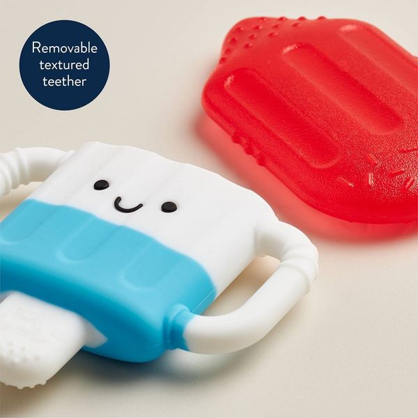 Children's teething toy with a removable textured part on a light background