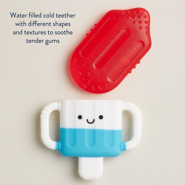 Red and blue baby teether with text on a beige background