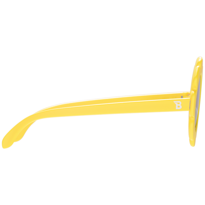 Yellow sunglasses with a brand logo on a white background