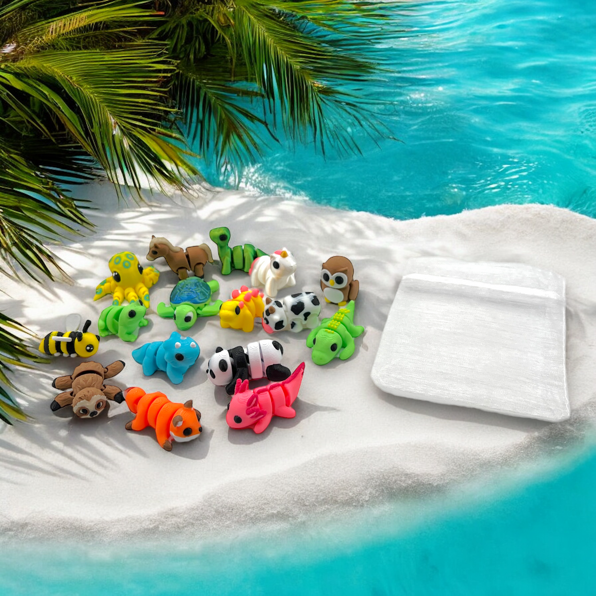 Colorful animal-shaped toys on a white towel by a pool with palm leaves in the background
