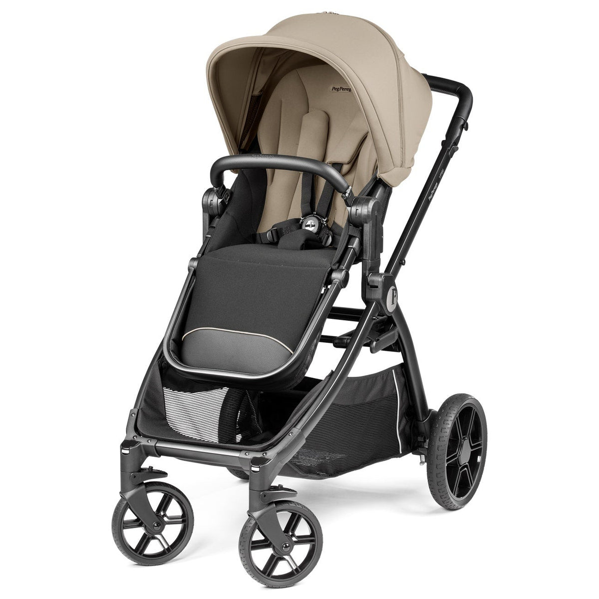 A stroller with a beige canopy and seat liner, a black footmuff, and a dark gray frame, shown from a three-quarter angle on a white background.