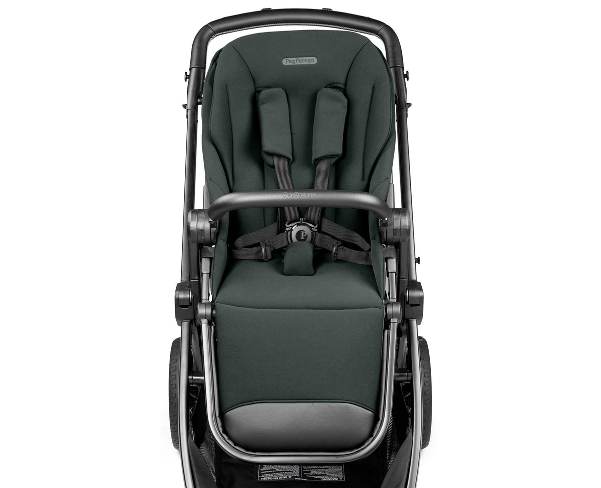 Green baby stroller with black frame on a white background