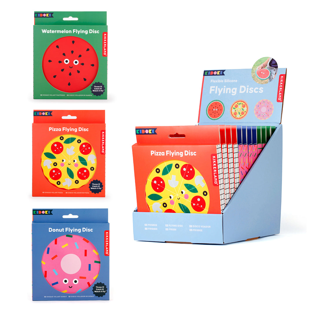 Collection of colorful packaging for flying discs shaped like a watermelon, pizza, and donut.