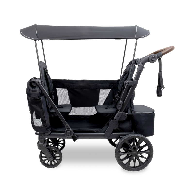 Black stroller with canopy on a white background