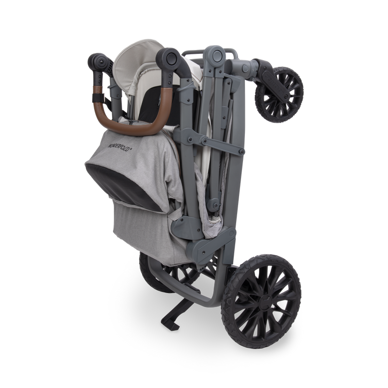 Gray and black stroller on a white background