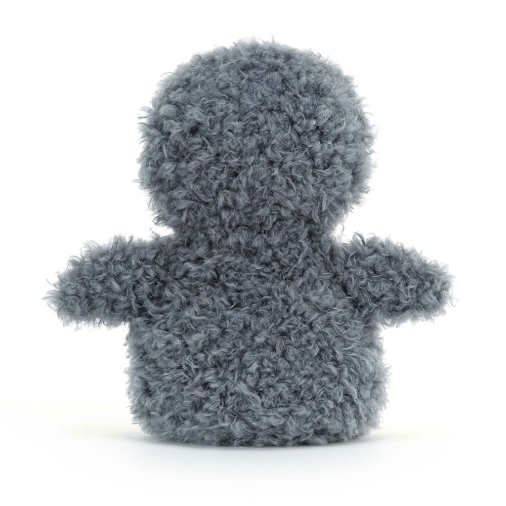 Fluffy gray toy on a white background
