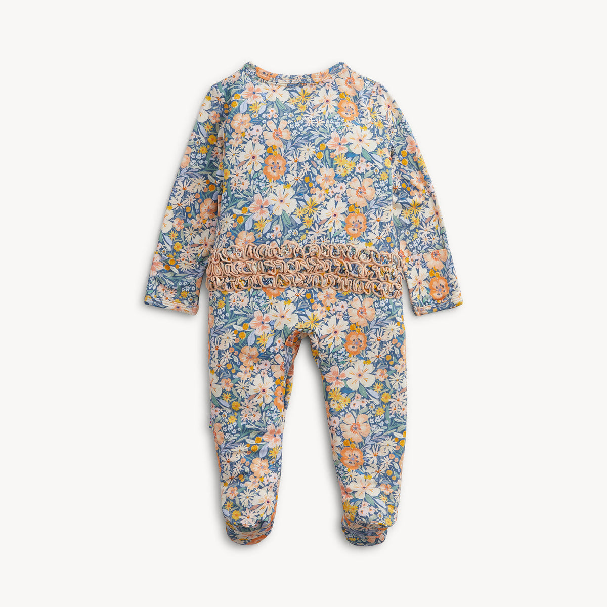 A baby footed one-piece jumpsuit with a blue floral print and a smocked waist, shown flat on a light gray background.