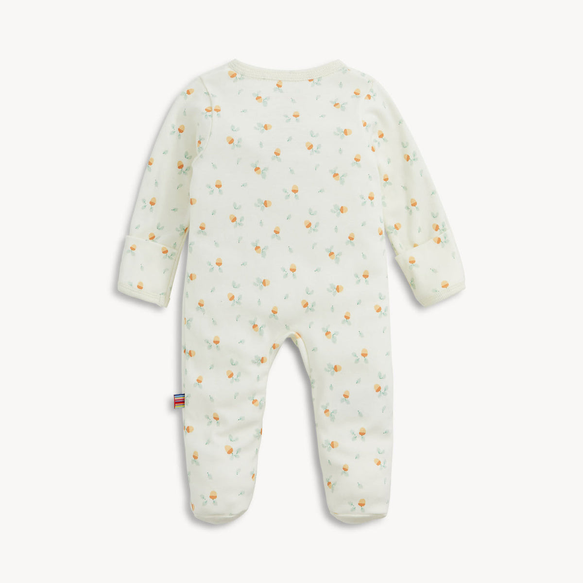 A baby footed sleeper in a soft off-white fabric, featuring a delicate all-over print of small orange flowers and light green leaves, shown from the back against a clean white background.