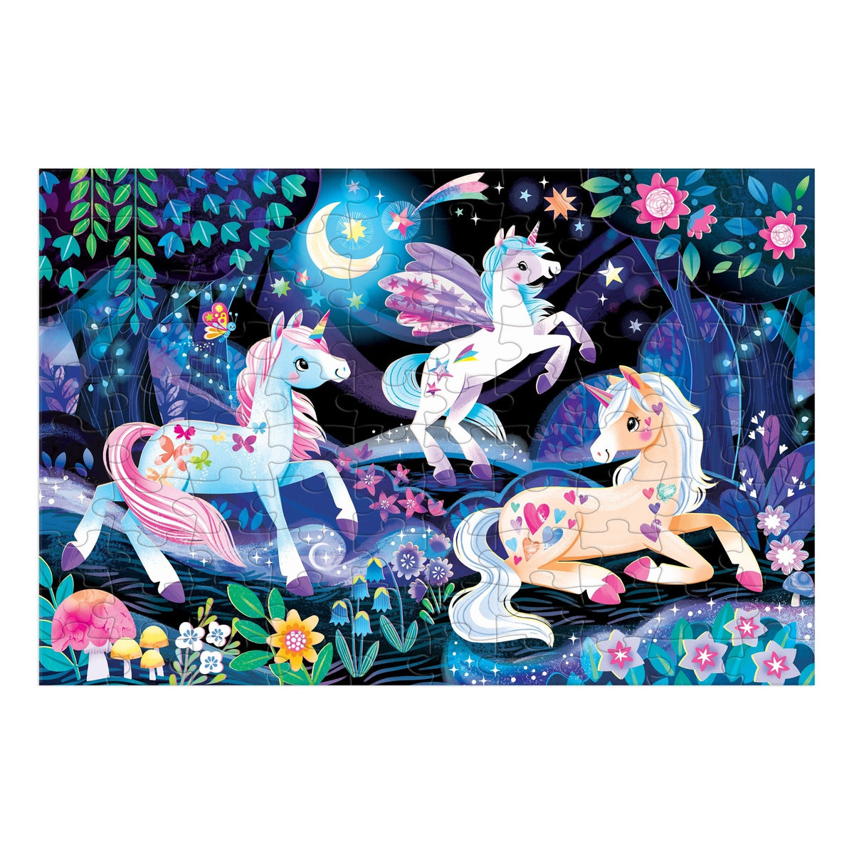 Close-up of the assembled Unicorn Dreams Glow in the Dark Puzzle featuring three detailed unicorns among glowing flowers and foliage under a starry night sky.