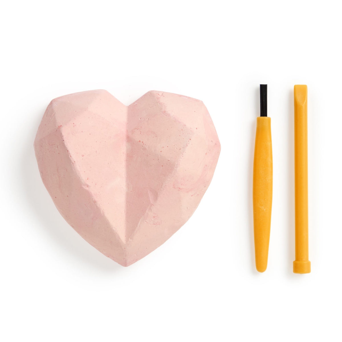 A pink heart-shaped digging block paired with two yellow excavation tools on a white background.