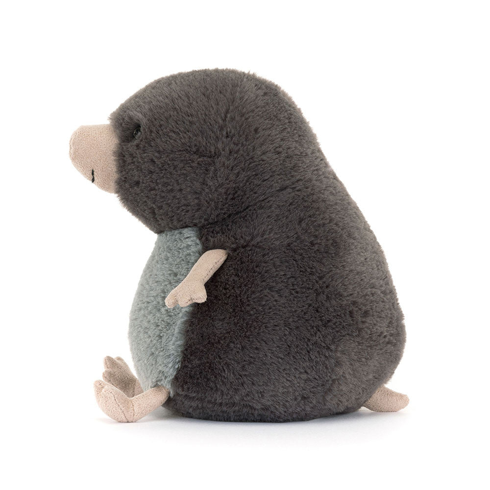 Stuffed animal mole toy on a white background