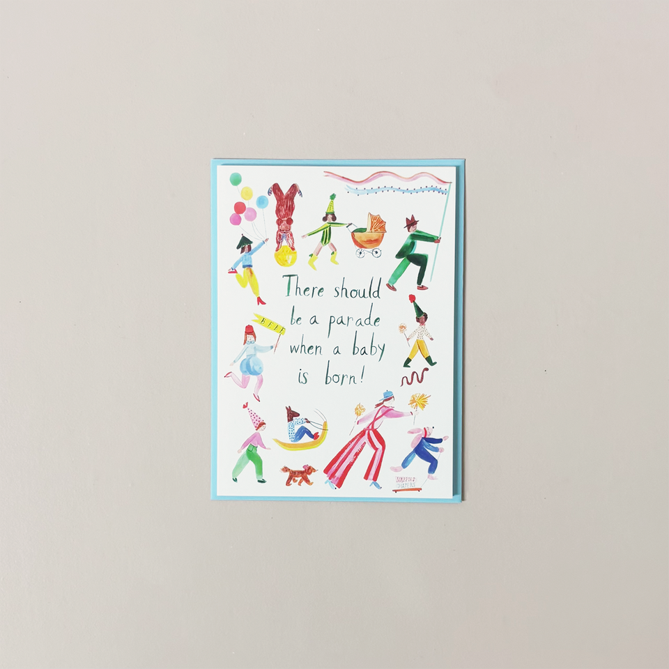 Colorful illustration of a baby shower card with text on a plain background