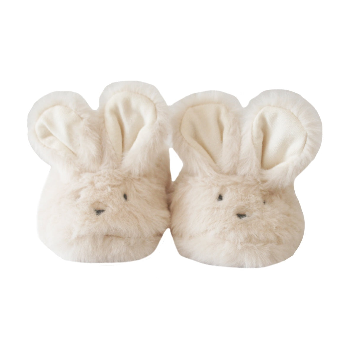 Pair of cream-colored bunny slippers on a white background