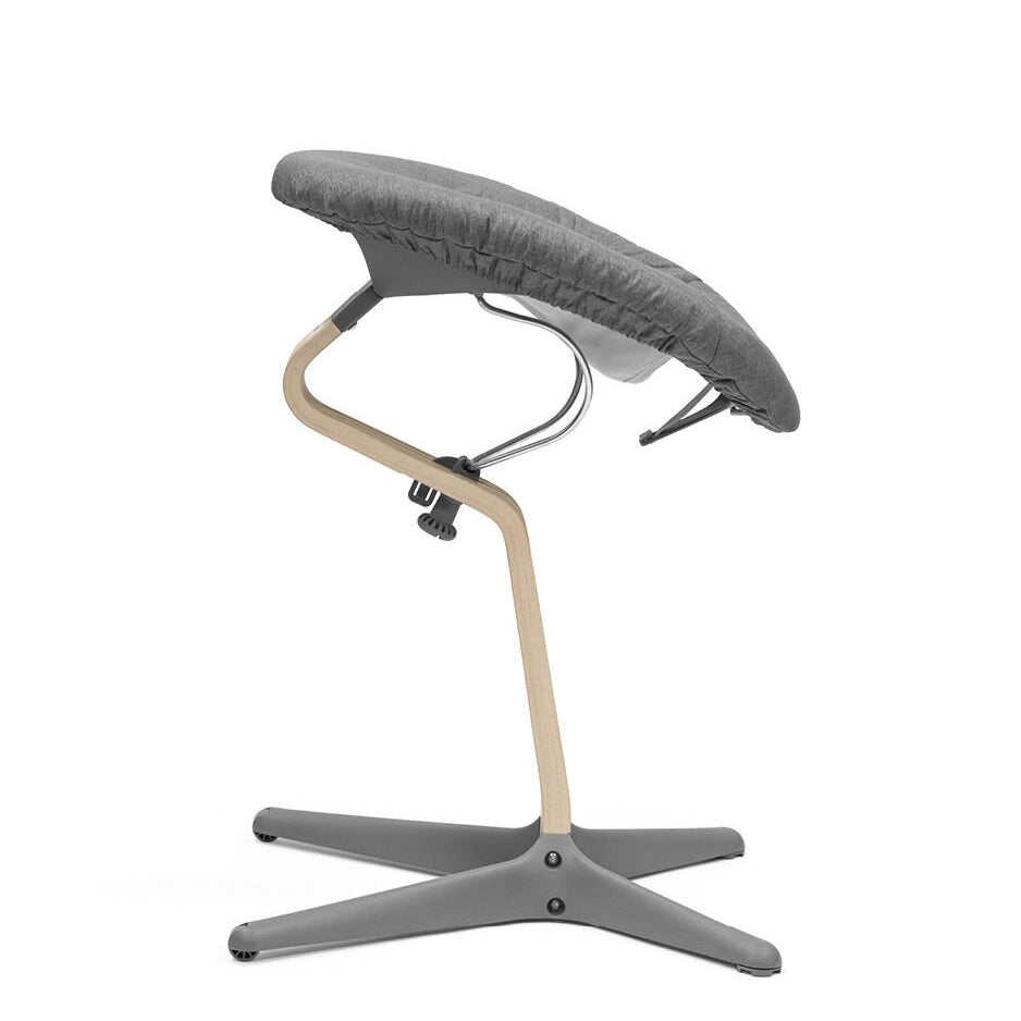 Gray ergonomic chair with a unique design on a white background