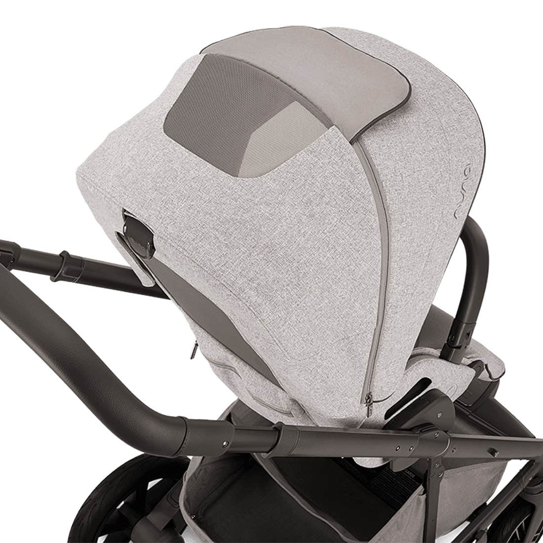 Gray baby seat on a stroller with a white background