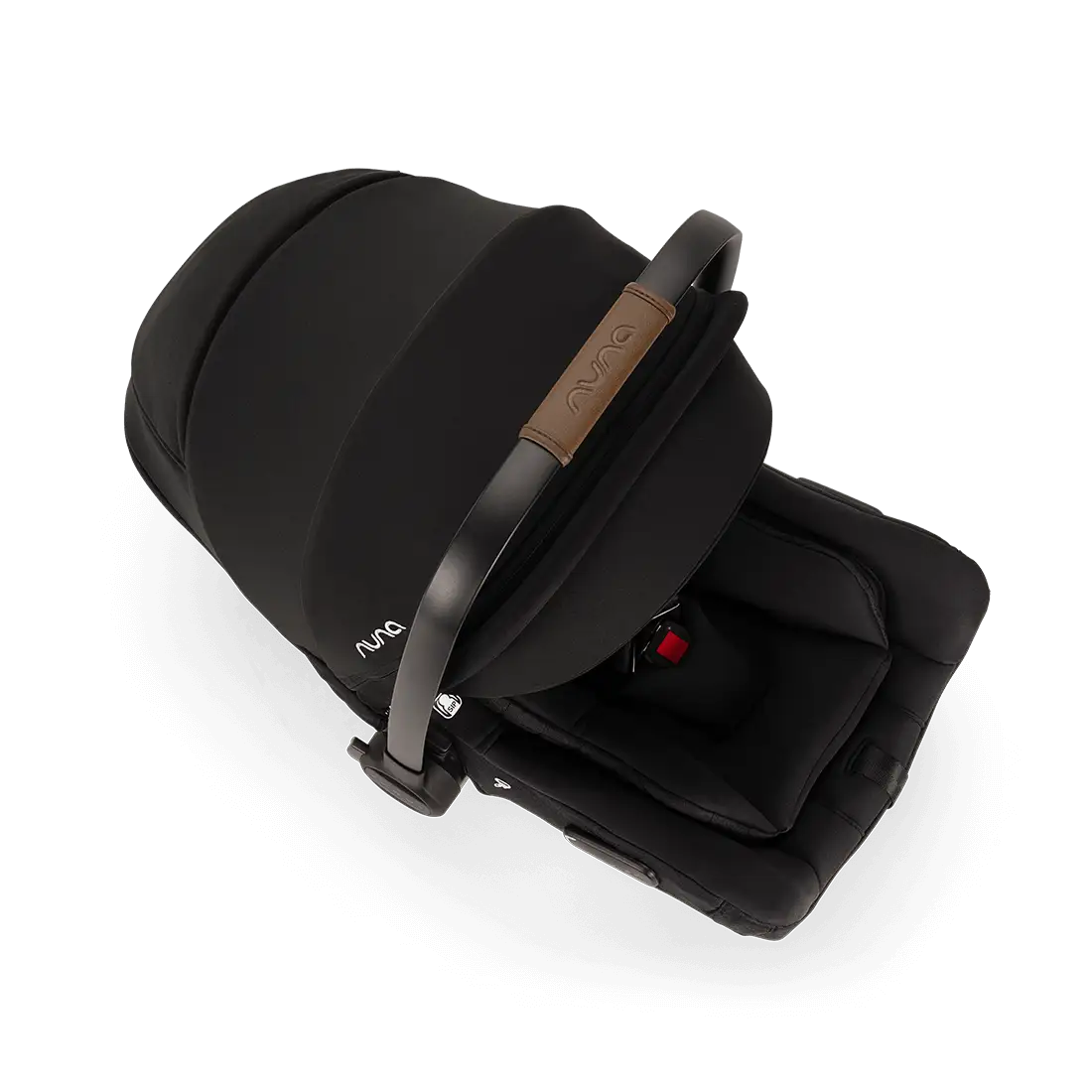 A close-up profile view of a black MIXX Next + Pipa Aire RX Travel System by Nuna infant car seat showing the brown leatherette handle wrap, set against a checkered transparent background.