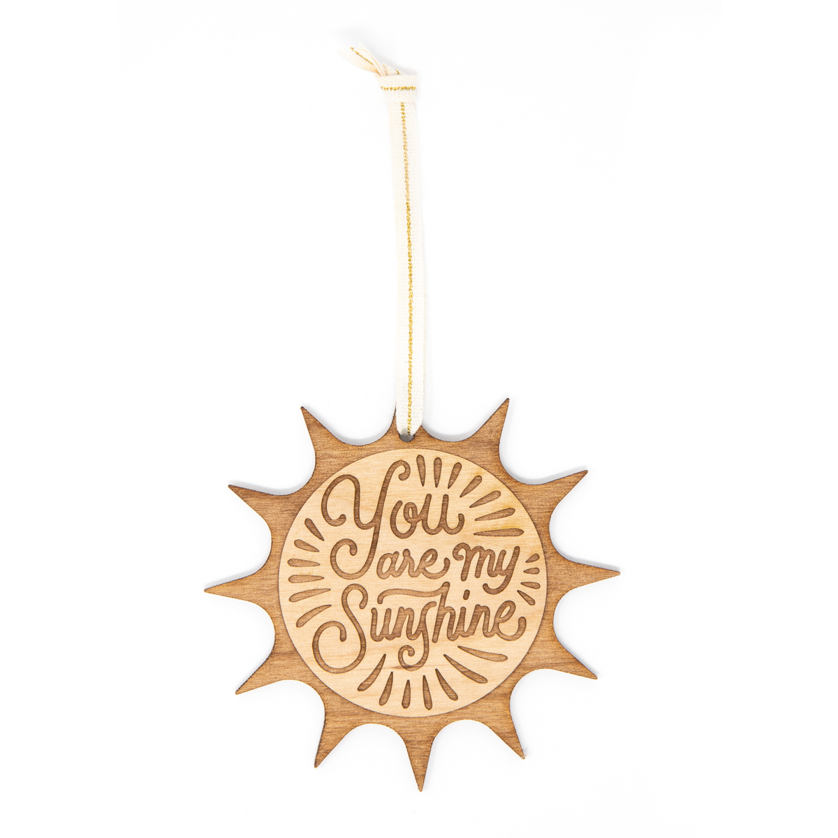 Wooden sun-shaped ornament with 'You are my sunshine' text on a white background
