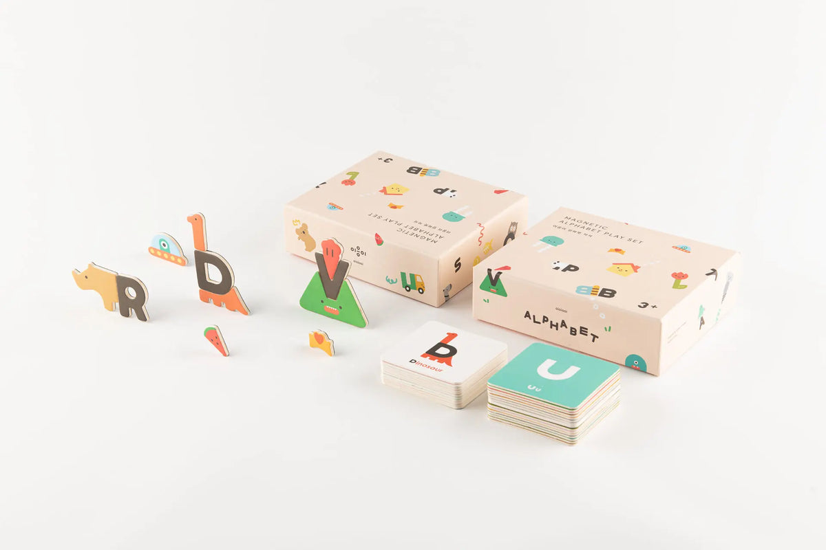 Children's alphabet letter blocks with packaging on a white background