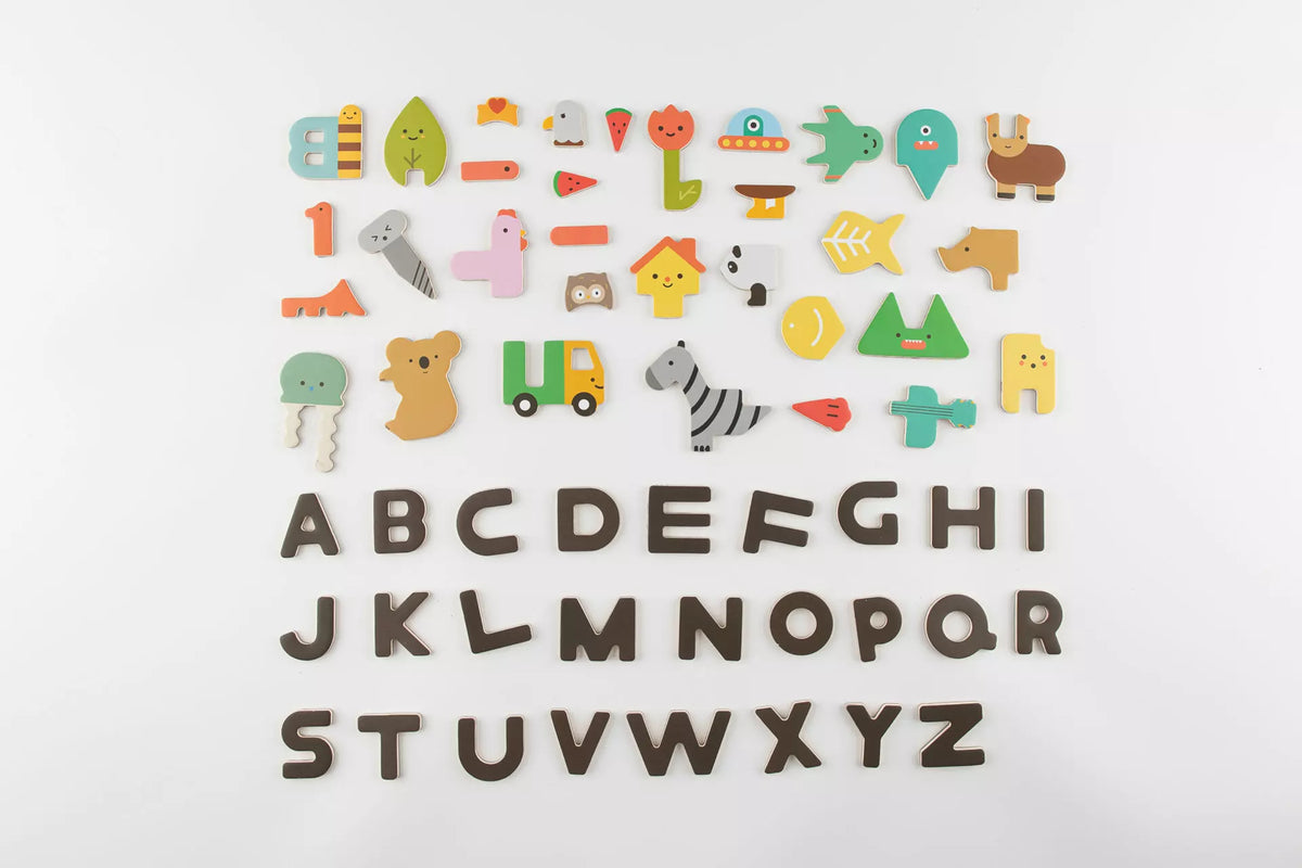 Alphabet letters and colorful toy figures on a white background