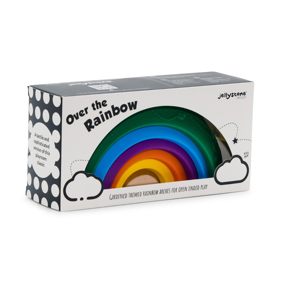 Box packaging of 'Over the Rainbow' toy with colorful rainbow design.