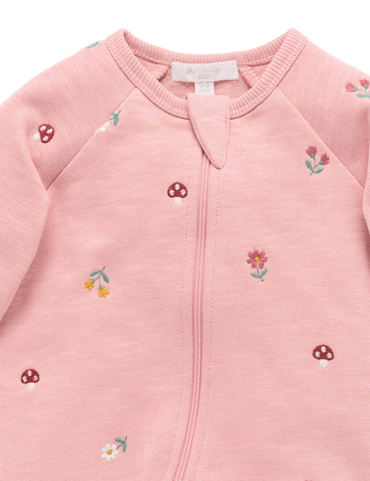 Pink baby jacket with floral embroidery on a white background